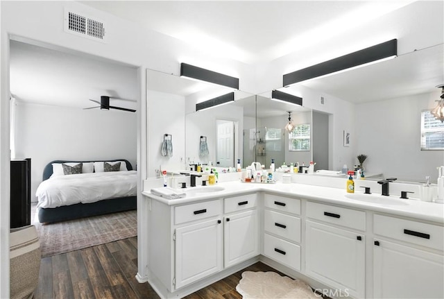 3 Bluff Cove Dr, Aliso Viejo, CA 92656 - ensuite bathroom featuring double vanity, wood finished floors, a ceiling fan, and a shower