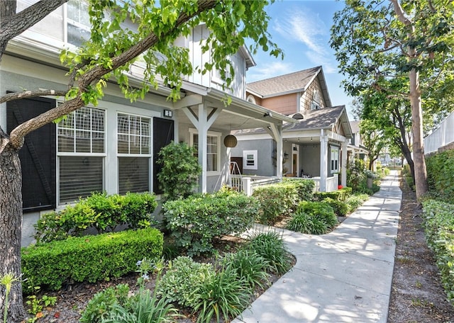 3 Bluff Cove Dr, Aliso Viejo, CA 92656 - view of front facade with covered porch and stucco siding