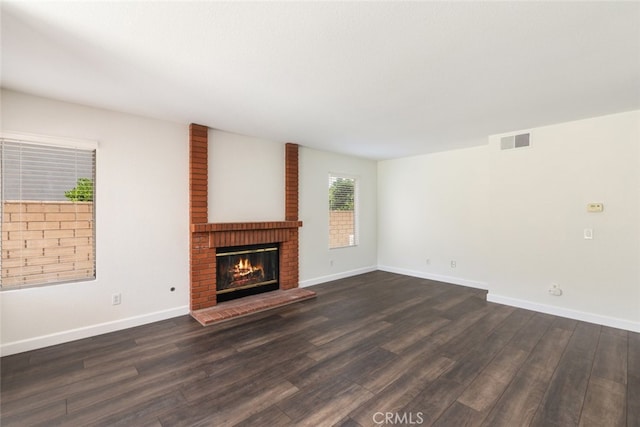 16783 Lake Knl, Riverside, CA 92503 - unfurnished living room with dark wood finished floors, a fireplace, and baseboards