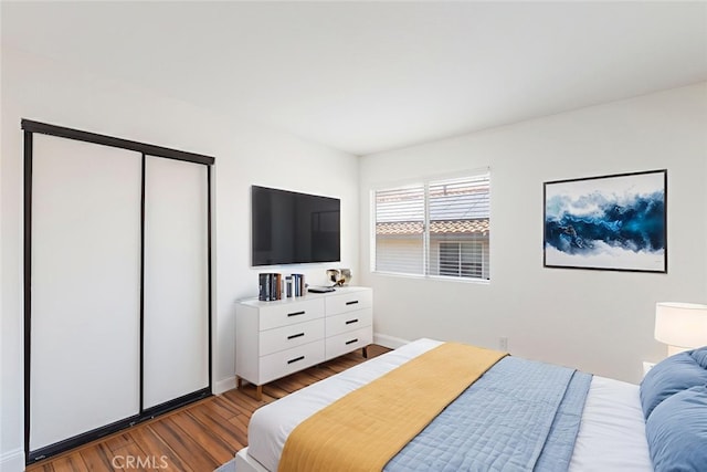 16783 Lake Knl, Riverside, CA 92503 - bedroom featuring wood finished floors, baseboards, and a closet