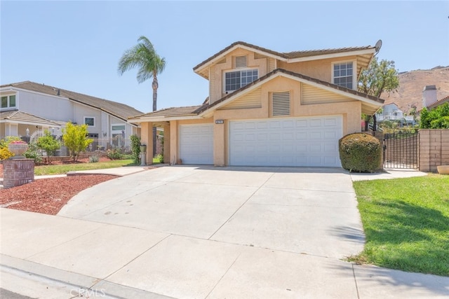 16783 Lake Knl, Riverside, CA 92503 - traditional-style home with stucco siding, a garage, driveway, and a tiled roof