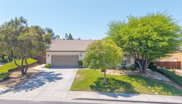 36867 Gallery Ln, Beaumont, CA 92223 - obstructed view of property with driveway, an attached garage, a tiled roof, and stucco siding
