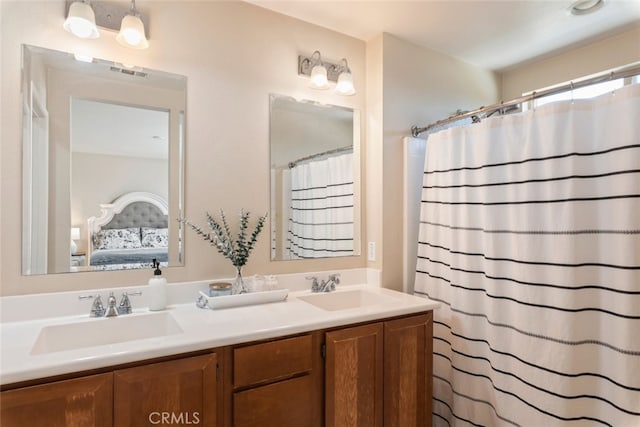 36867 Gallery Ln, Beaumont, CA 92223 - full bathroom with ensuite bathroom, double vanity, and a shower with curtain
