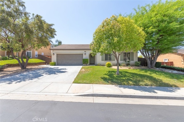 36867 Gallery Ln, Beaumont, CA 92223 - view of front of property with a garage, concrete driveway, stucco siding, and a tiled roof