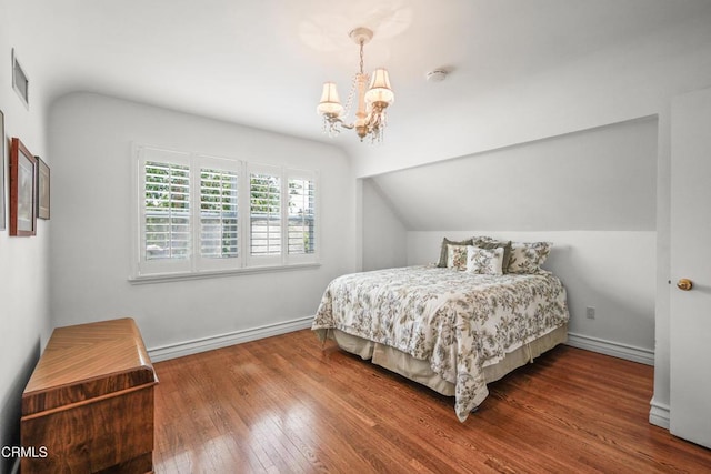 829 E Ada Ave, Glendora, CA 91741 - bedroom featuring a chandelier, lofted ceiling, wood-type flooring, baseboards, and a baseboard heating unit