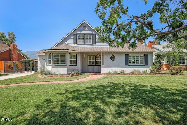 829 E Ada Ave, Glendora, CA 91741 - view of front of home with a gate, roof with shingles, a chimney, and stucco siding