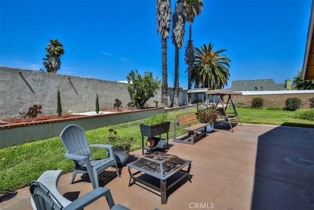 3012 Homer Cir, Jurupa Valley, CA 91752 - fenced backyard with a patio area