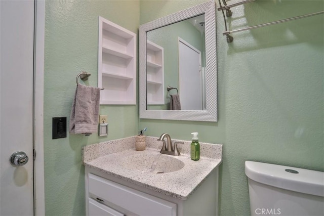 3012 Homer Cir, Jurupa Valley, CA 91752 - half bathroom with vanity and a textured wall