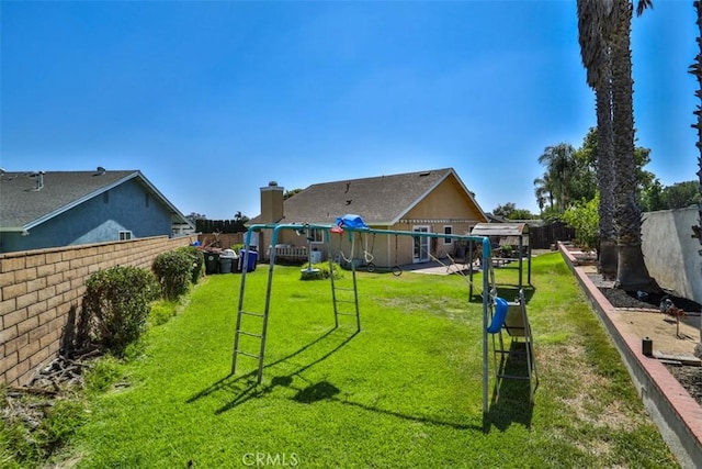 3012 Homer Cir, Jurupa Valley, CA 91752 - fenced yard featuring a playground