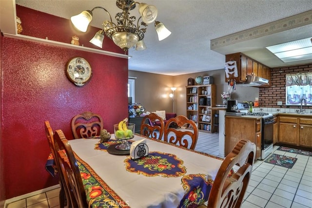 3012 Homer Cir, Jurupa Valley, CA 91752 - dining room with light tile patterned flooring, a textured ceiling, and a chandelier
