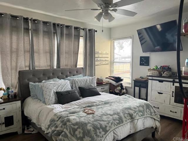 2840 Ridgeway Dr, National City, CA 91950 - bedroom with dark wood finished floors and ceiling fan