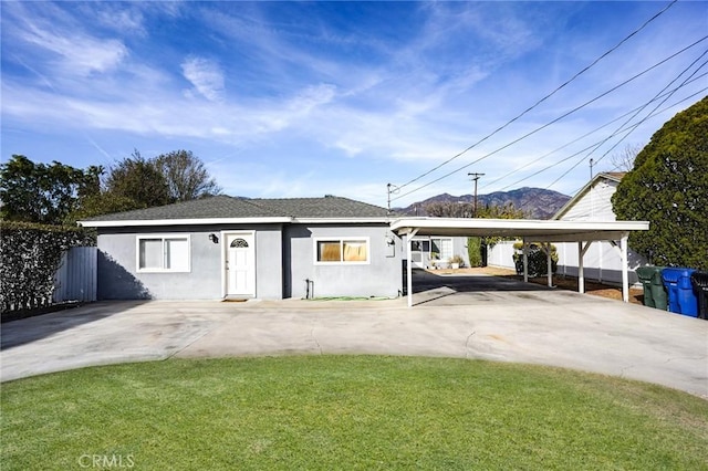 911 Genoa St, Monrovia, CA 91016 - view of front facade with concrete driveway, stucco siding, and a mountain view
