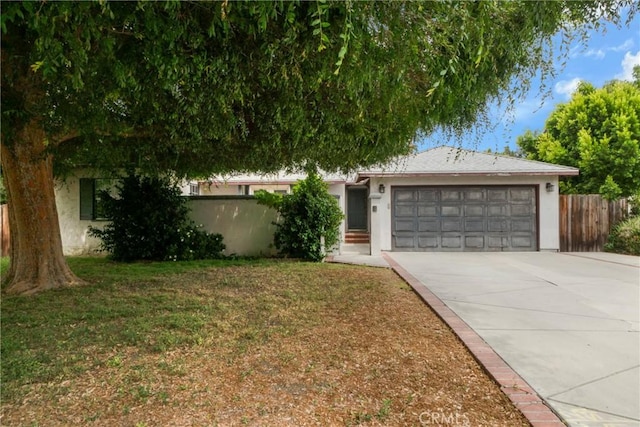 4622 Burnet Ave, Sherman Oaks, CA 91403 - view of front facade with a garage, driveway, and stucco siding