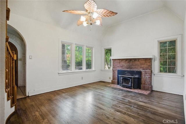 915 Poplar St, Chico, CA 95928 - unfurnished living room featuring lofted ceiling, a ceiling fan, arched walkways, and wood finished floors