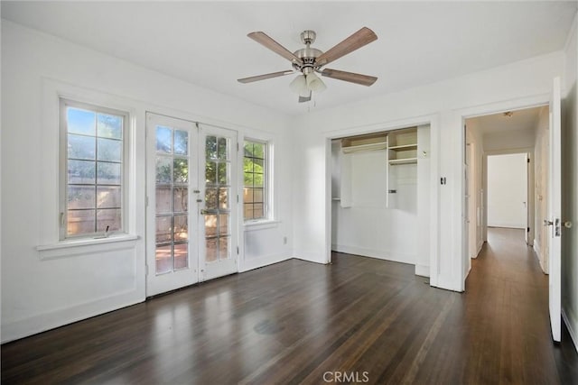 915 Poplar St, Chico, CA 95928 - unfurnished bedroom with french doors, dark wood-style floors, a closet, access to exterior, and a ceiling fan