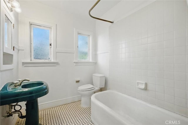 915 Poplar St, Chico, CA 95928 - bathroom featuring tile patterned floors and washtub / shower combination