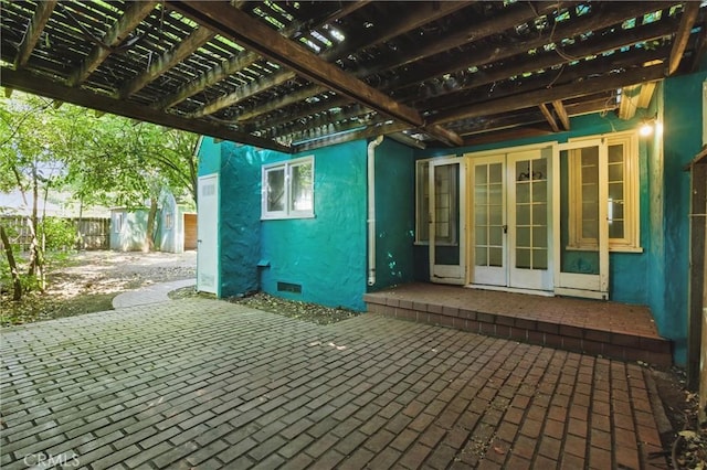 915 Poplar St, Chico, CA 95928 - view of patio / terrace featuring french doors, a storage unit, and a pergola