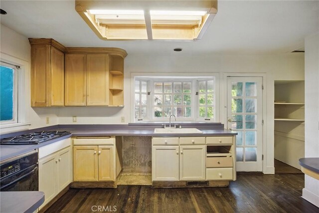 915 Poplar St, Chico, CA 95928 - kitchen featuring gas stovetop, oven, dark wood-style floors, and open shelves