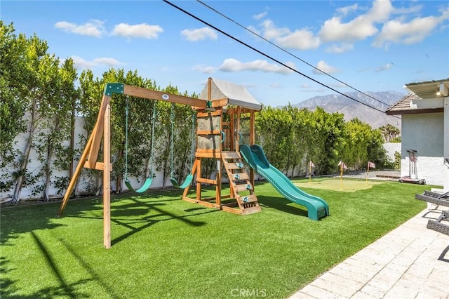 2230 N Volturno Rd, Palm Springs, CA 92262 - view of jungle gym with a mountain view and an area to practice putting