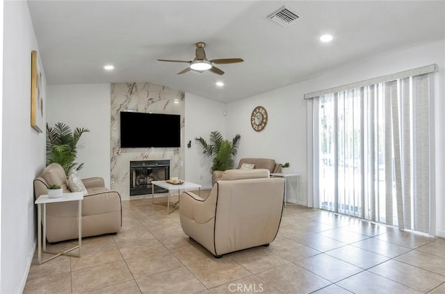 2230 N Volturno Rd, Palm Springs, CA 92262 - living room with healthy amount of natural light, a ceiling fan, a premium fireplace, light tile patterned floors, and recessed lighting