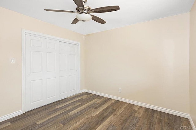 575 7th St # 203, Imperial Beach, CA 91932 - unfurnished bedroom featuring baseboards, dark wood-type flooring, a closet, and ceiling fan