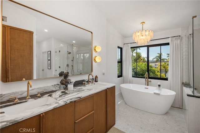 2317 Via Zafiro, San Clemente, CA 92673 - bathroom featuring a stall shower, a soaking tub, double vanity, and a chandelier