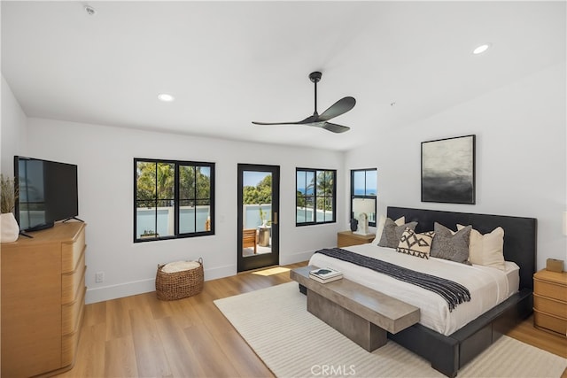 2317 Via Zafiro, San Clemente, CA 92673 - bedroom with access to exterior, multiple windows, light wood-style flooring, recessed lighting, and lofted ceiling