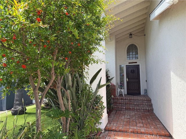 8730 Twin Trails Dr, San Diego, CA 92129 - doorway to property with stucco siding