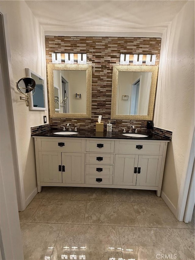 8730 Twin Trails Dr, San Diego, CA 92129 - bathroom featuring double vanity and backsplash