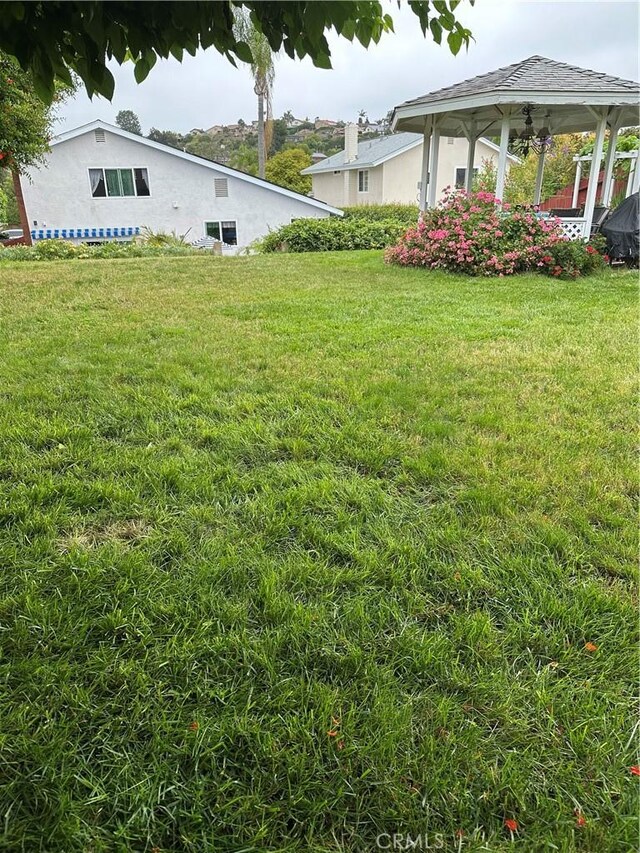 8730 Twin Trails Dr, San Diego, CA 92129 - view of grassy yard featuring a gazebo