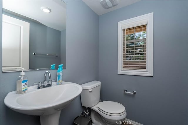 2038 Mesquite Ln, Colton, CA 92324 - half bath featuring a sink and toilet