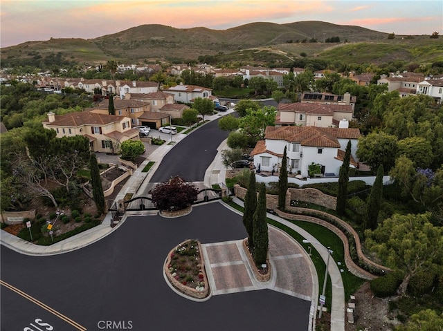 38 Via Sonrisa, San Clemente, CA 92673 - aerial overview of property's location with a mountain backdrop and nearby suburban area
