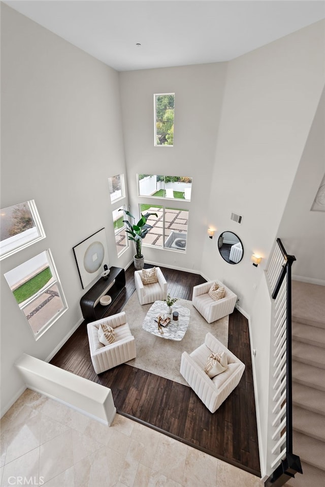 38 Via Sonrisa, San Clemente, CA 92673 - living room with a towering ceiling, baseboards, and stairs