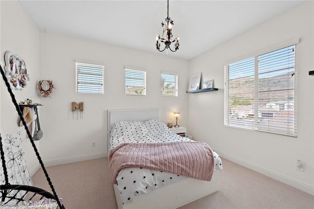 38 Via Sonrisa, San Clemente, CA 92673 - bedroom with multiple windows, carpet floors, a chandelier, and baseboards