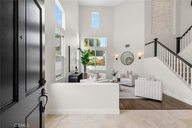 38 Via Sonrisa, San Clemente, CA 92673 - foyer with stairway, baseboards, a towering ceiling, and wood finished floors