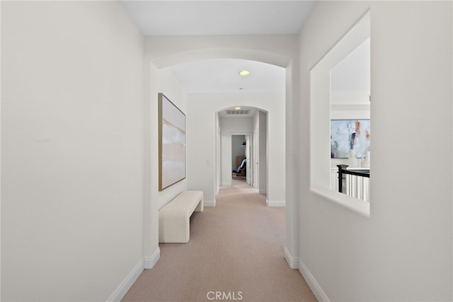 38 Via Sonrisa, San Clemente, CA 92673 - hall featuring arched walkways, light carpet, and baseboards