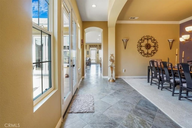 889 Highridge St, Riverside, CA 92506 - hall with arched walkways, healthy amount of natural light, crown molding, and baseboards