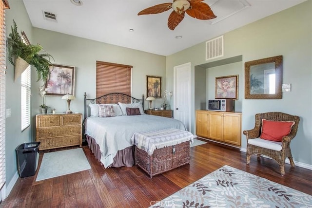 889 Highridge St, Riverside, CA 92506 - bedroom featuring dark wood finished floors, a ceiling fan, and baseboards