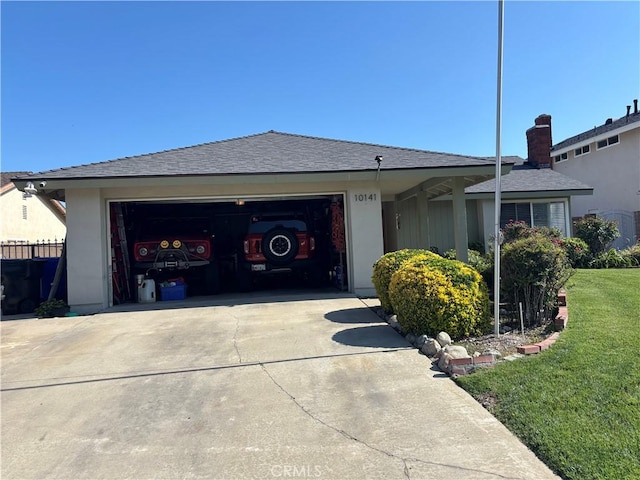 10141 Orange St, Rancho Cucamonga, CA 91737 - view of front of property with concrete driveway, a garage, and a front yard