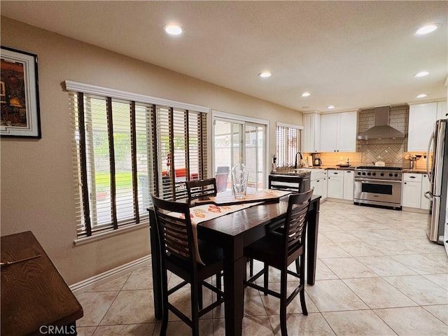 10141 Orange St, Rancho Cucamonga, CA 91737 - dining room featuring recessed lighting, light tile patterned floors, and baseboards