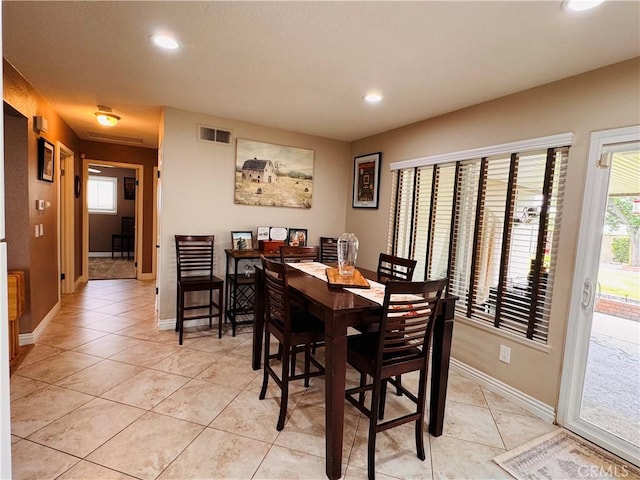 10141 Orange St, Rancho Cucamonga, CA 91737 - dining room featuring recessed lighting, light tile patterned flooring, and baseboards