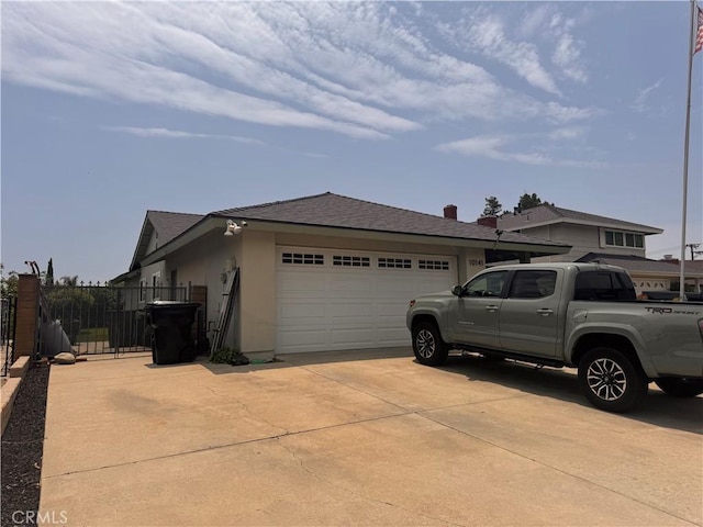 10141 Orange St, Rancho Cucamonga, CA 91737 - view of home's exterior with an attached garage, concrete driveway, stucco siding, and a shingled roof