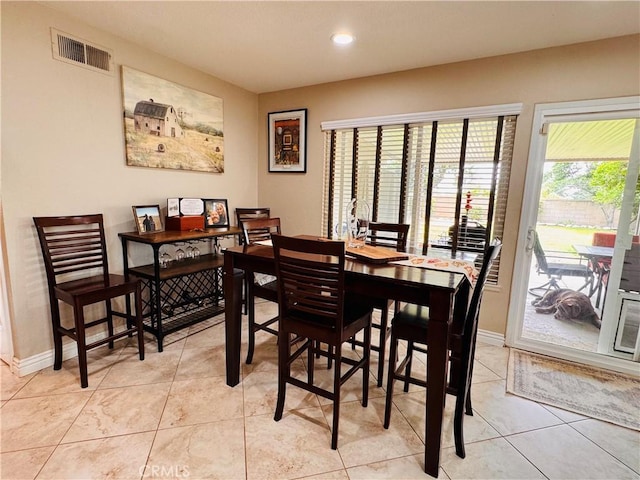 10141 Orange St, Rancho Cucamonga, CA 91737 - dining area featuring light tile patterned floors, baseboards, and recessed lighting