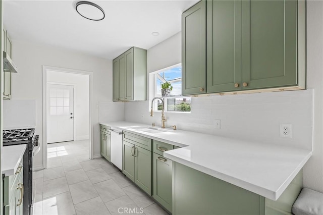 16801 Nordhoff St, Northridge, CA 91343 - kitchen featuring green cabinetry, gas range, decorative backsplash, and light countertops