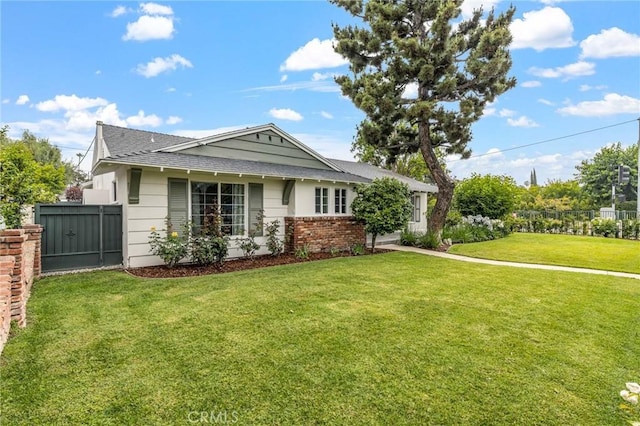 16801 Nordhoff St, Northridge, CA 91343 - view of front facade featuring roof with shingles and brick siding