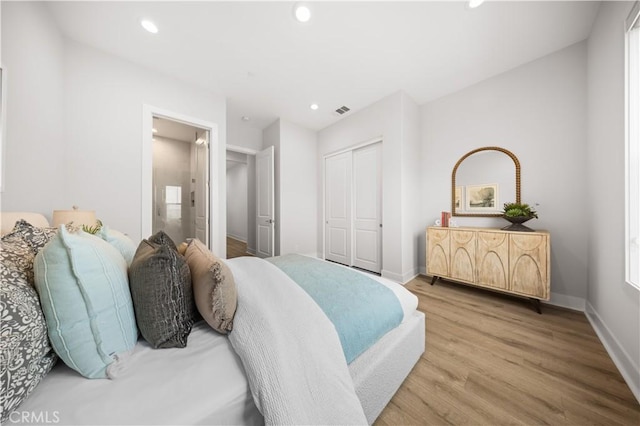 271 Huckleberry, Lake Forest, CA 92630 - bedroom with wood finished floors, a closet, recessed lighting, baseboards, and ensuite bath