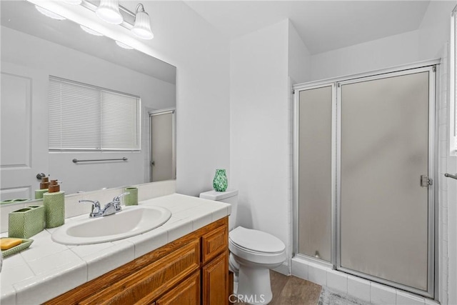 356 Myrl Pl, Hemet, CA 92545 - full bathroom with vanity, a stall shower, and wood finished floors