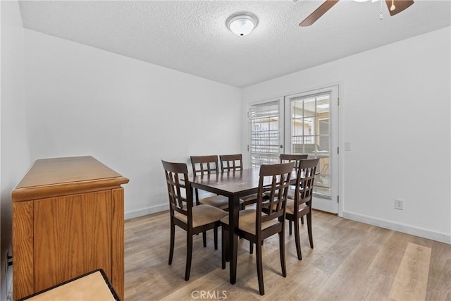 356 Myrl Pl, Hemet, CA 92545 - dining area with light wood-style flooring, a textured ceiling, and ceiling fan