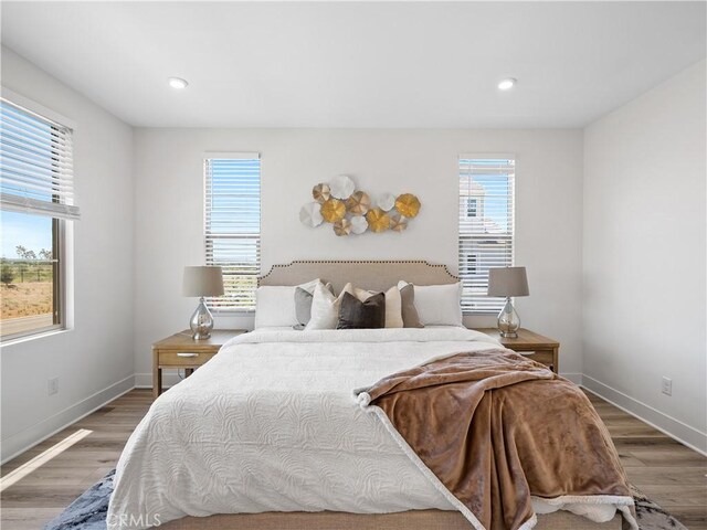 191 Lynx, Irvine, CA 92618 - bedroom with wood finished floors, multiple windows, baseboards, and recessed lighting