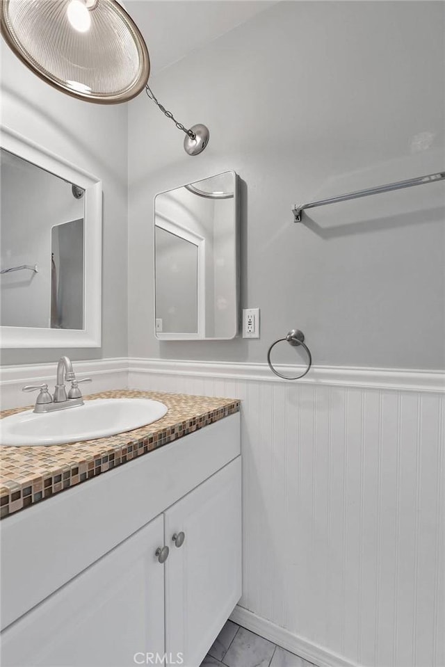 11777 Preston Ln, Yucaipa, CA 92399 - bathroom with vanity and wainscoting
